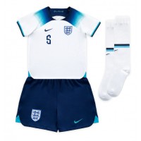 Camisa de time de futebol Inglaterra John Stones #5 Replicas 1º Equipamento Infantil Mundo 2022 Manga Curta (+ Calças curtas)